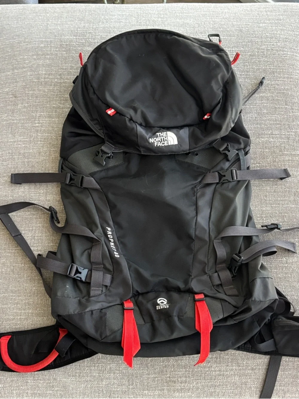 The North Face Black Backpack with Red Accents - Men's Hiking Pack